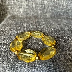 Goldish flat and round beaded stretchy bracelet!  $8